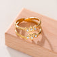 Bague dorée double ligne avec pétales à strass