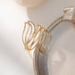 Bague dorée ajustable fleur