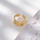 Bague dorée ajustable triple ligne épaisse