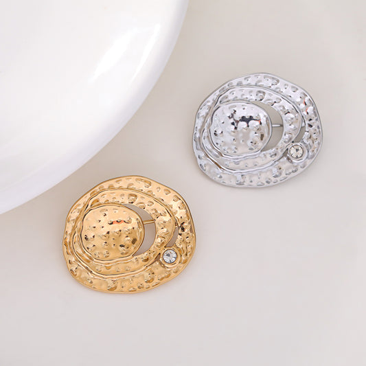 Broche rose dorée