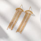 Boucles d'oreilles dorées chaînes pendantes