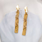 Boucles d'oreilles dorées pendantes martelés multi rectangle