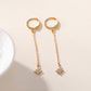 Boucles d'oreilles minis anneaux avec étoiles pendantes