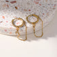 Boucles d'oreilles dorées mini créoles avec chaînes et étoiles