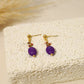Boucles d'oreilles avec pierre violet