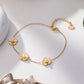 Bracelet chaîne avec 3 fleurs à perles