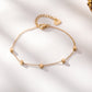Bracelet doré chaîne avec 5 cubes