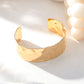 Wide hammered bangle bracelet