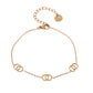 Bracelet doré chaîne avec triple cercle croisé