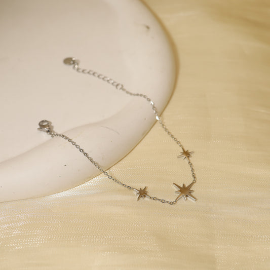 Bracelet chaîne argentée étoiles