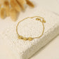 Bracelet chaîne dorée avec triple pastille ronde