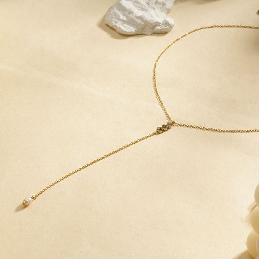 Collier triple strass en Y avec une perle