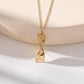 Collier chaîne dorée avec pendentif rectangle ondulé