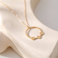 Collier chaîne dorée avec pendentif rond