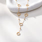 Collier doré avec multi cercle en Y