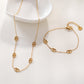 Collier chaîne dorée avec 5 cercles croisés