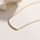 Collier chaîne dorée avec barre en strass