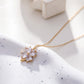 Collier chaîne dorée avec pendentif fleur à strass