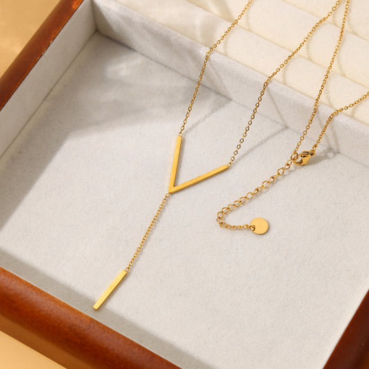 Collier chaîne fine dorée v en Y