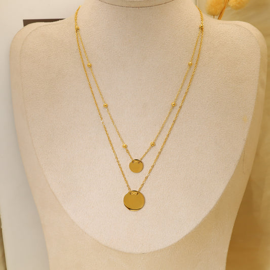 Collier double chaîne avec pendentifs ronds