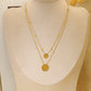 Collier double chaîne avec pendentifs ronds