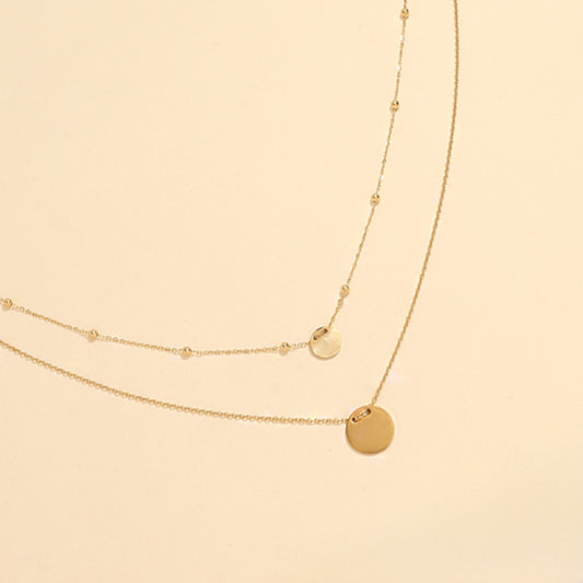 Collier double chaîne avec pendentifs ronds