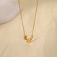 Collier chaîne dorée avec triple pastille
