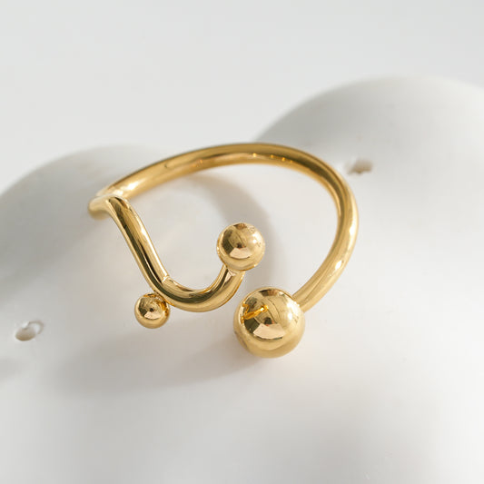 Bague Dorée Ajustable Courbe Avec Trois Boules