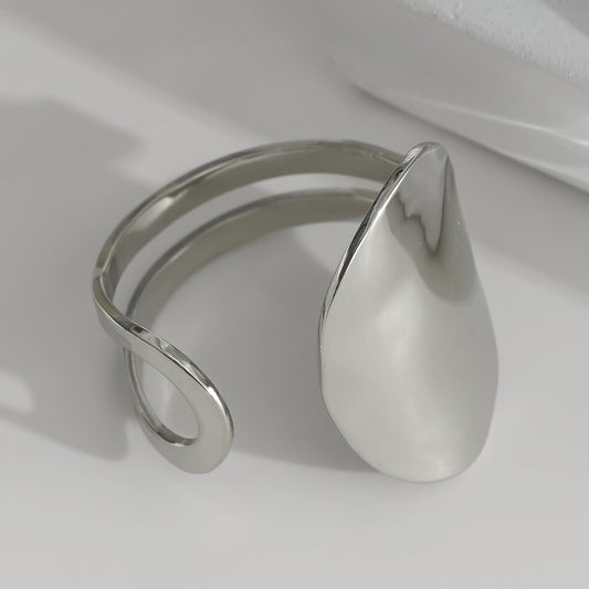 Bague Argentée Ouverte Disque Courbé Brillant