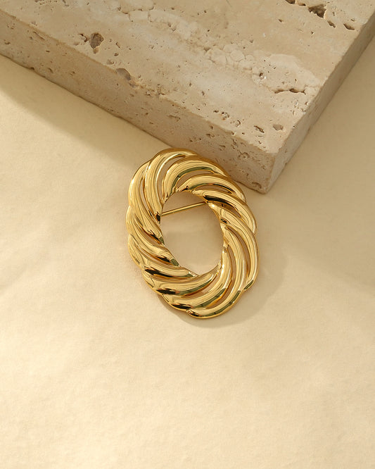Broche Dorée Disque Ovale Creux Motif Vague