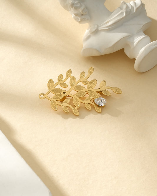Broche Dorée Feuillage Texturé Orné de Strass Goutte