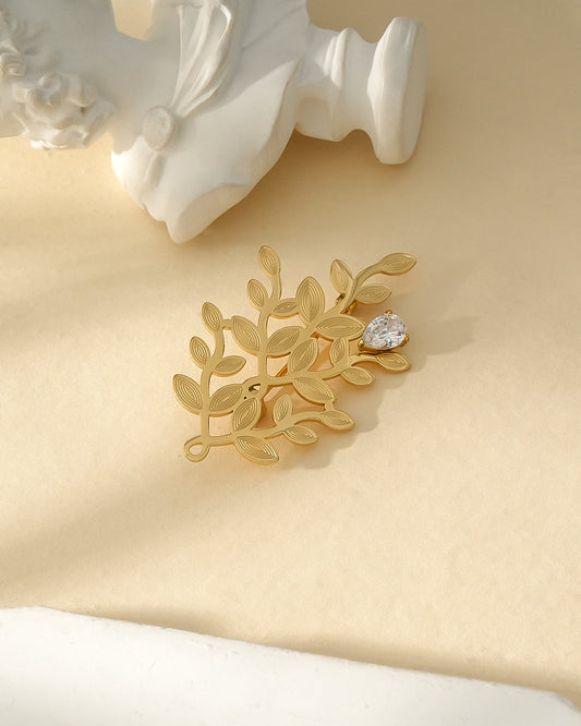 Broche Dorée Feuillage Texturé Orné de Strass Goutte