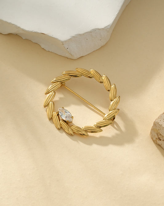 Broche Dorée Couronne de Feuilles Fines Orné de Strass