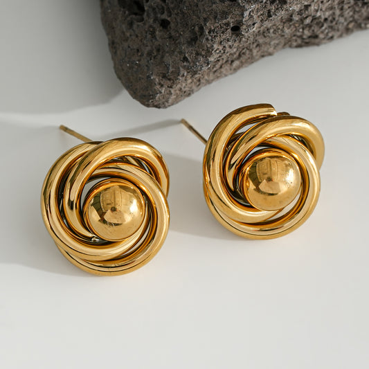 Boucles d'Oreilles Dorées Créoles Epaisses Croisées Avec Boule