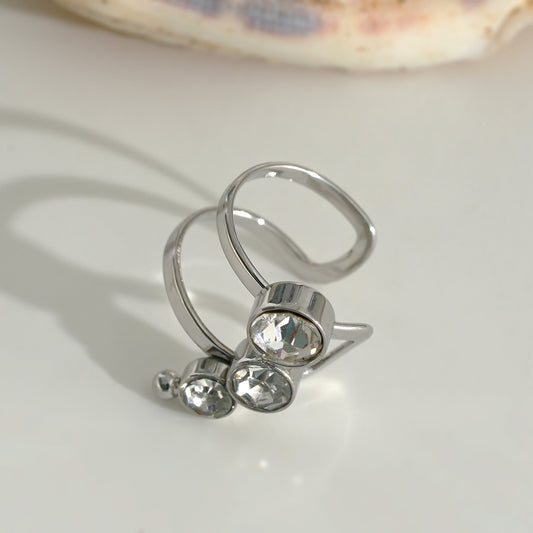 Bijou d'oreille earcuff argenté avec trois oxyde de zirconium