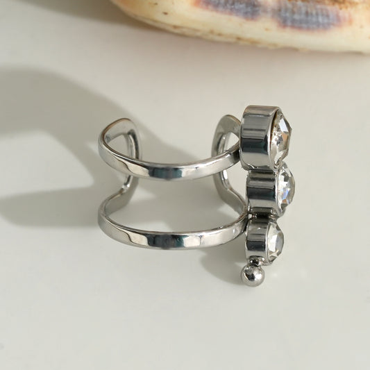 Bijou d'oreille earcuff argenté avec trois oxyde de zirconium