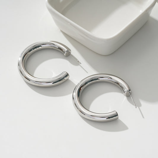 Boucles d'Oreilles Argentées Créoles Ouvertes en Acier