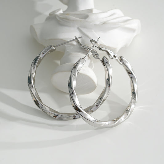 Boucles d'Oreilles Argentées Créoles Torsadées Brillantes