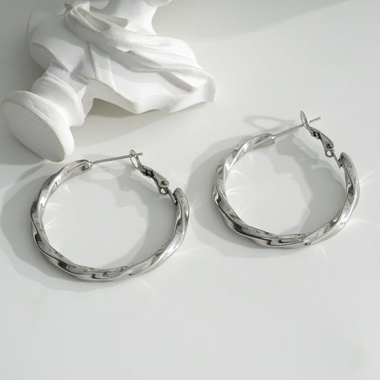 Boucles d'Oreilles Argentées Créoles Torsadées Brillantes