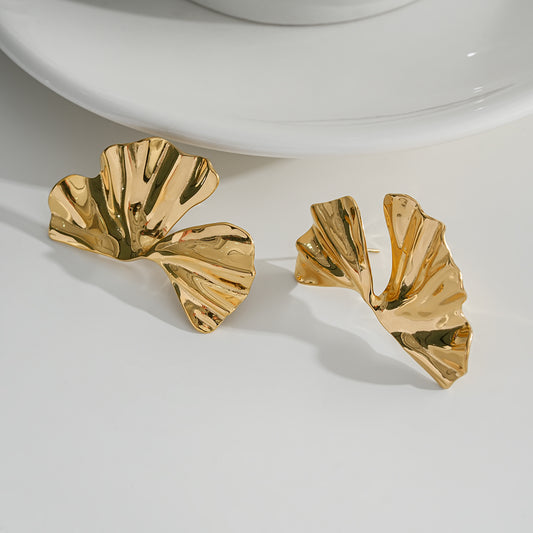 Boucles d'oreilles dorées fleur séparée