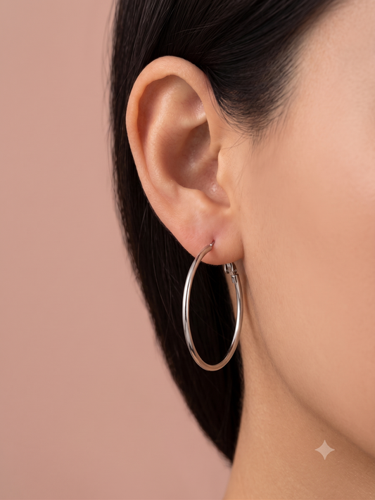 Boucles d'oreilles créoles rondes argentées lisses