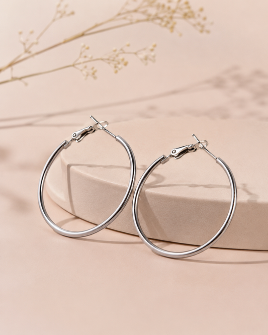 Boucles d'oreilles créoles rondes argentées lisses
