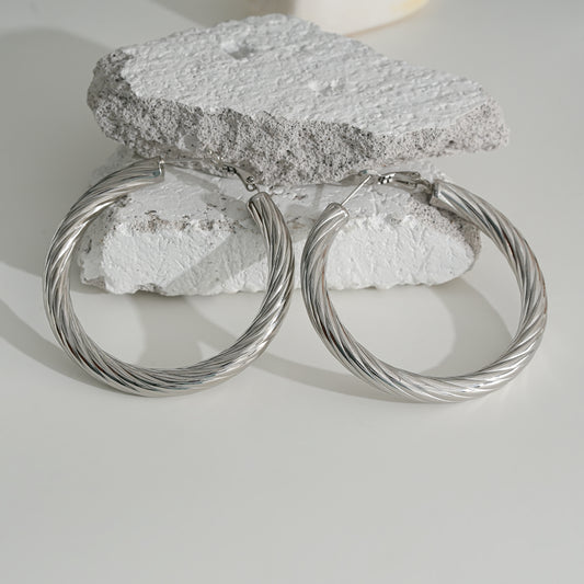 Boucles d'Oreilles Argentées Créoles Gravures Courbes Empilées