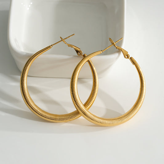 Boucles d'Oreilles Dorées Créoles Motifs Ressorts