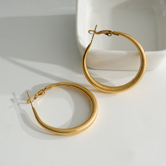 Boucles d'Oreilles Dorées Créoles Motifs Ressorts
