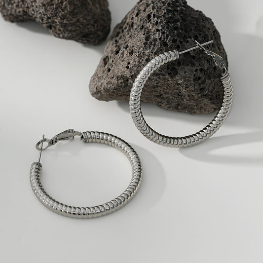 Boucles d'Oreilles Argentées Créoles Motifs Bobines