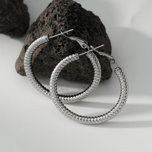 Boucles d'Oreilles Argentées Créoles Motifs Bobines