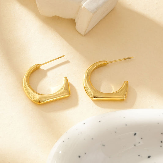 Boucles d'Oreilles Créoles Dorées Sculptural