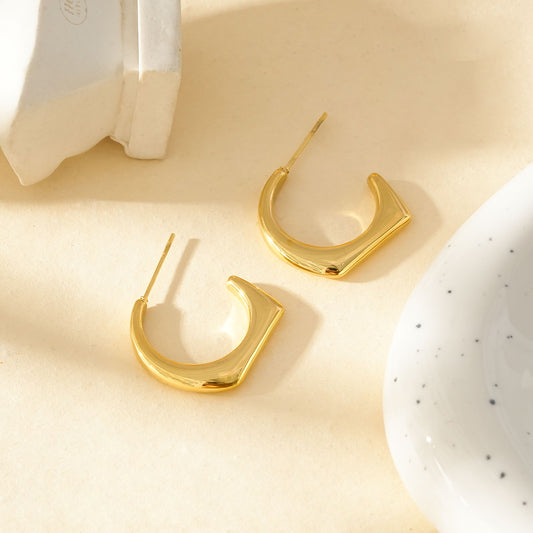 Boucles d'Oreilles Créoles Dorées Sculptural