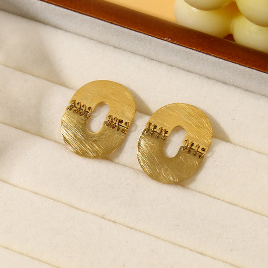 Boucles d'Oreilles Dorées Brossés Relié